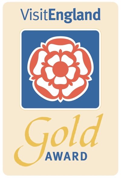 Logo for  VisitEngland Gold Award for outstanding accommodation & customer service